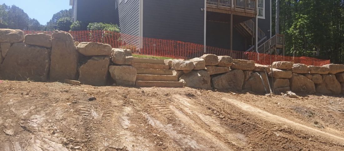 Stone wall with built-in steps