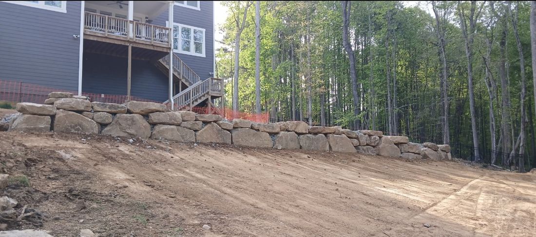 Finished stone retaining wall