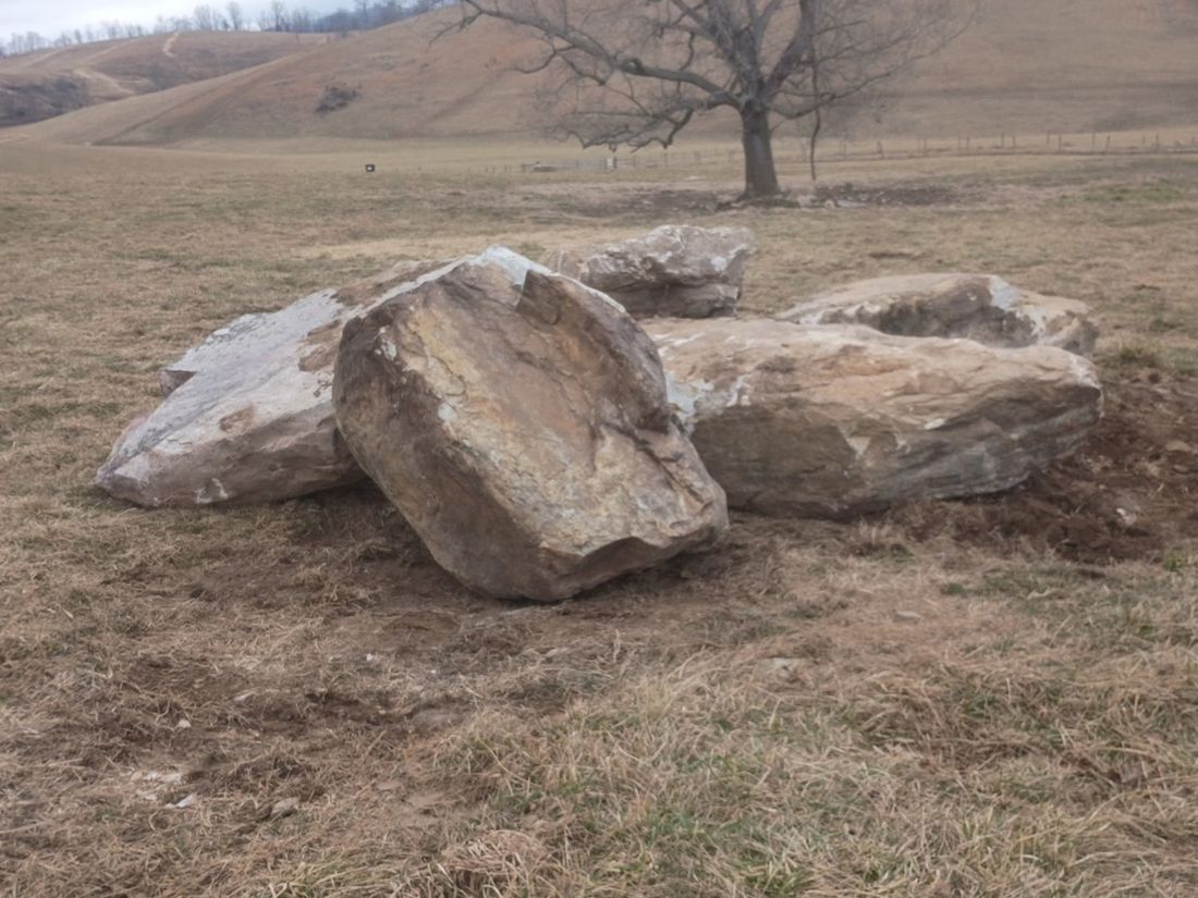 Freshly excavated stone in a field