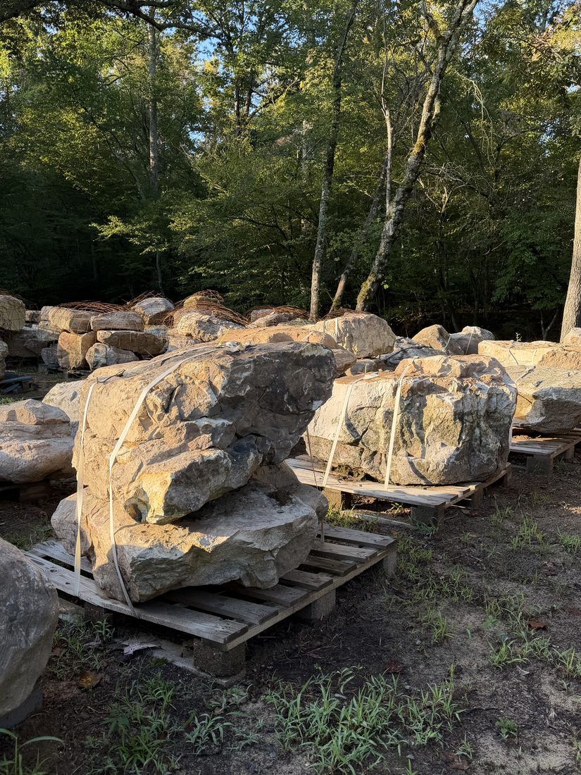 Boulders strapped on pallets