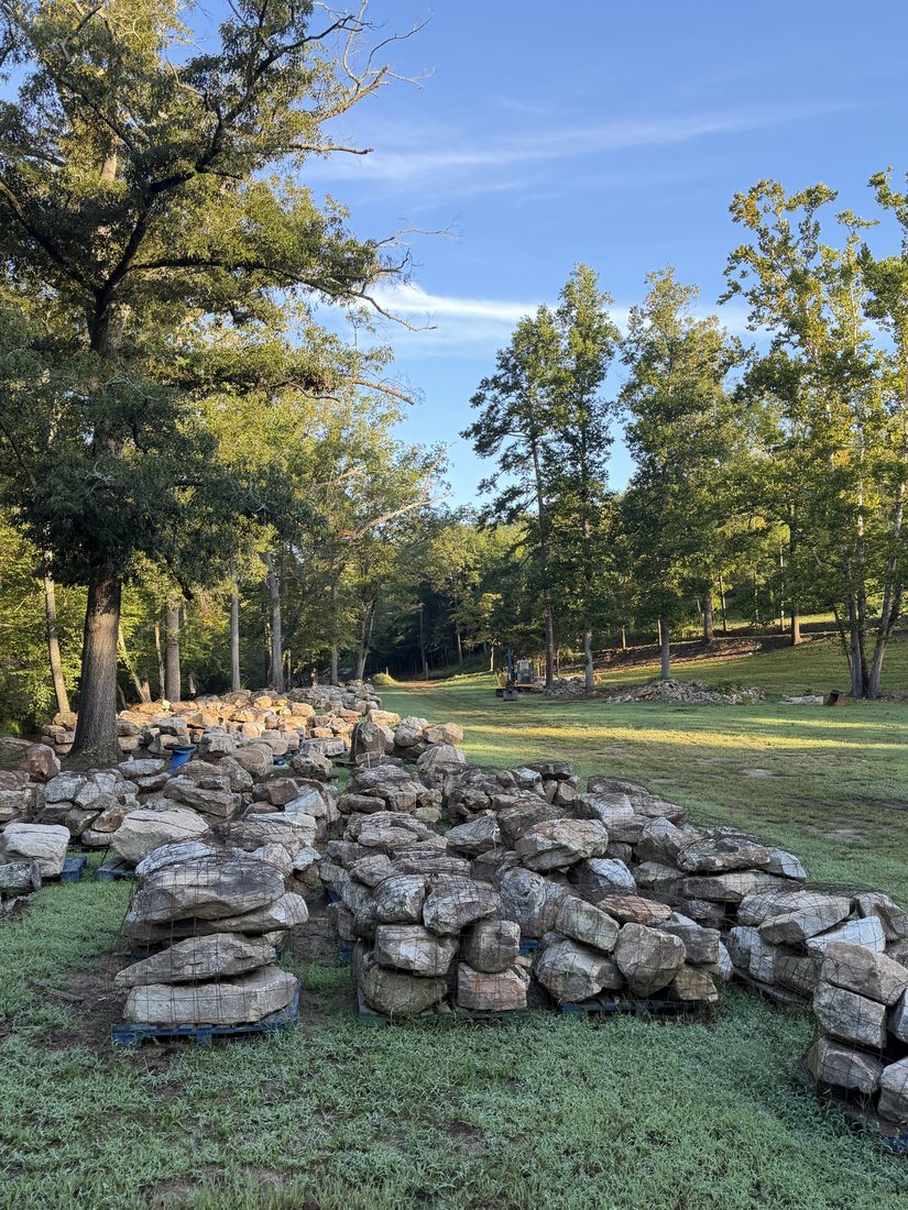Rows of palletized stone in the yard